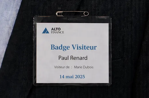 Safety pin attachment for visitor badges