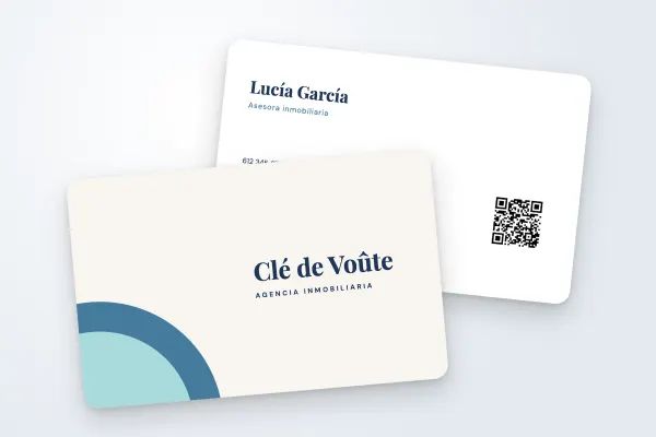 Modelo de tarjeta de visita «Clé de Voûte» (inmobiliaria, formas redondeadas azules): anverso y reverso