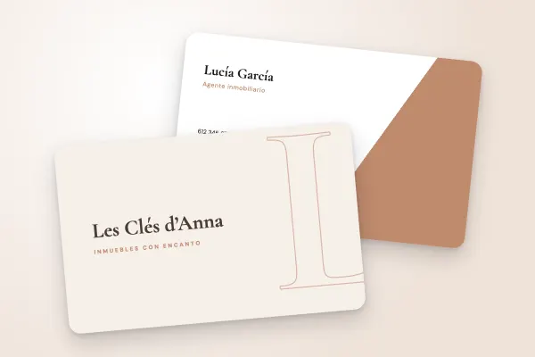 Modelo de tarjeta de visita «Les Clés d’Anna» (inmobiliaria, monograma, rosa cobrizo): anverso y reverso