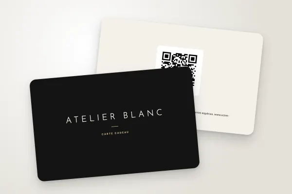 Modèle de carte cadeau « Atelier Blanc » (salons, instituts et spas, capitales espacées, noir et champagne) : recto et verso