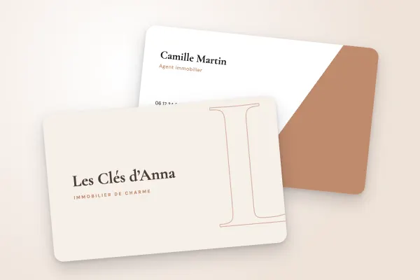 Modèle de carte de visite « Les Clés d’Anna » (immobilier, monogramme, rose cuivré) : recto et verso