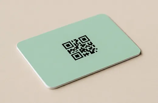 Gift card with QR code for digital activation and online redemption