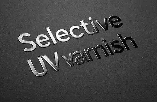 Gift card with spot UV varnish on logo area for premium tactile contrast